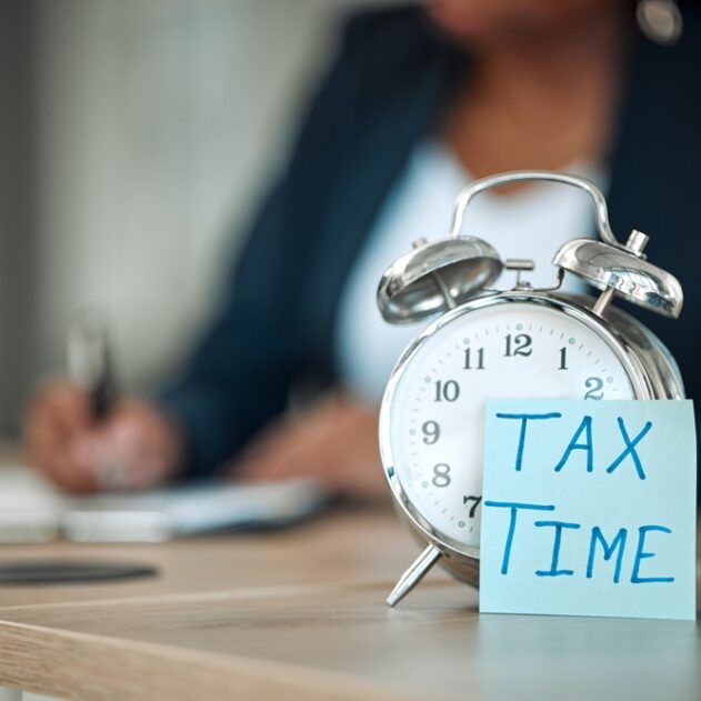 Tax Preparation and Filing Taxes, time and business person writing for financial report, accounting paperwork and documents or.